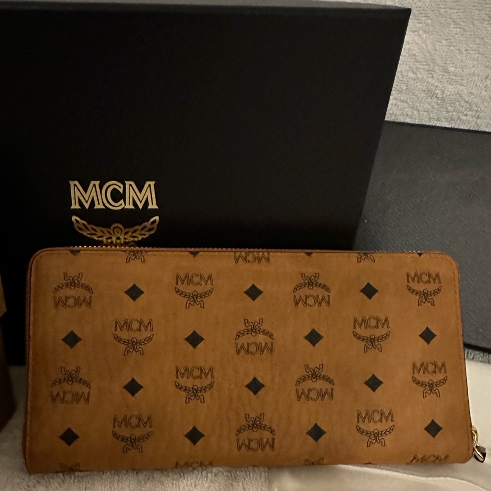 New MCM brown Zippy wallet signature print